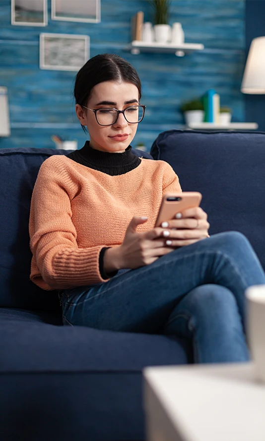 Woman searching for a therapist on her phone