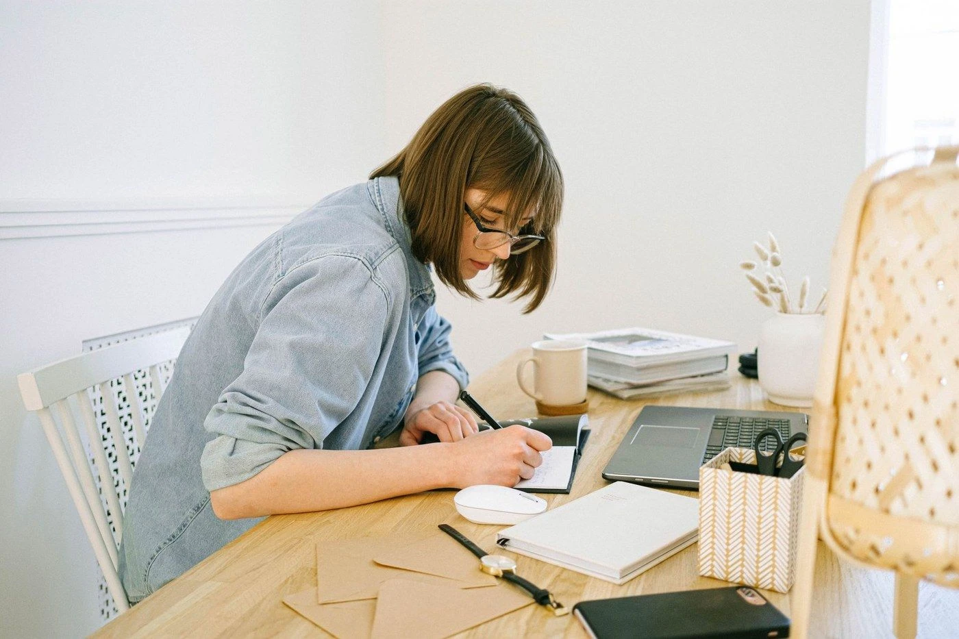 A person reviewing a website on a laptop