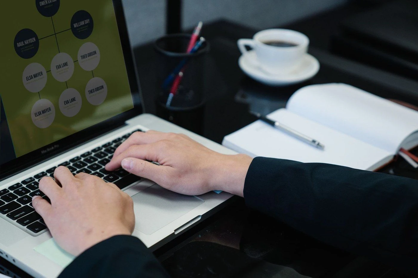 A person working through a checklist on a laptop